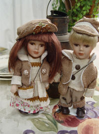vintage porcelain girl and boy doll (usa)