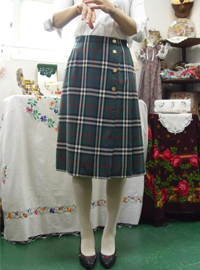 Burberrys classic goldbutton wrap Wool skirt 