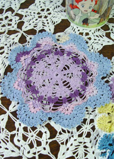 Handmade  crochet  doily (violet )